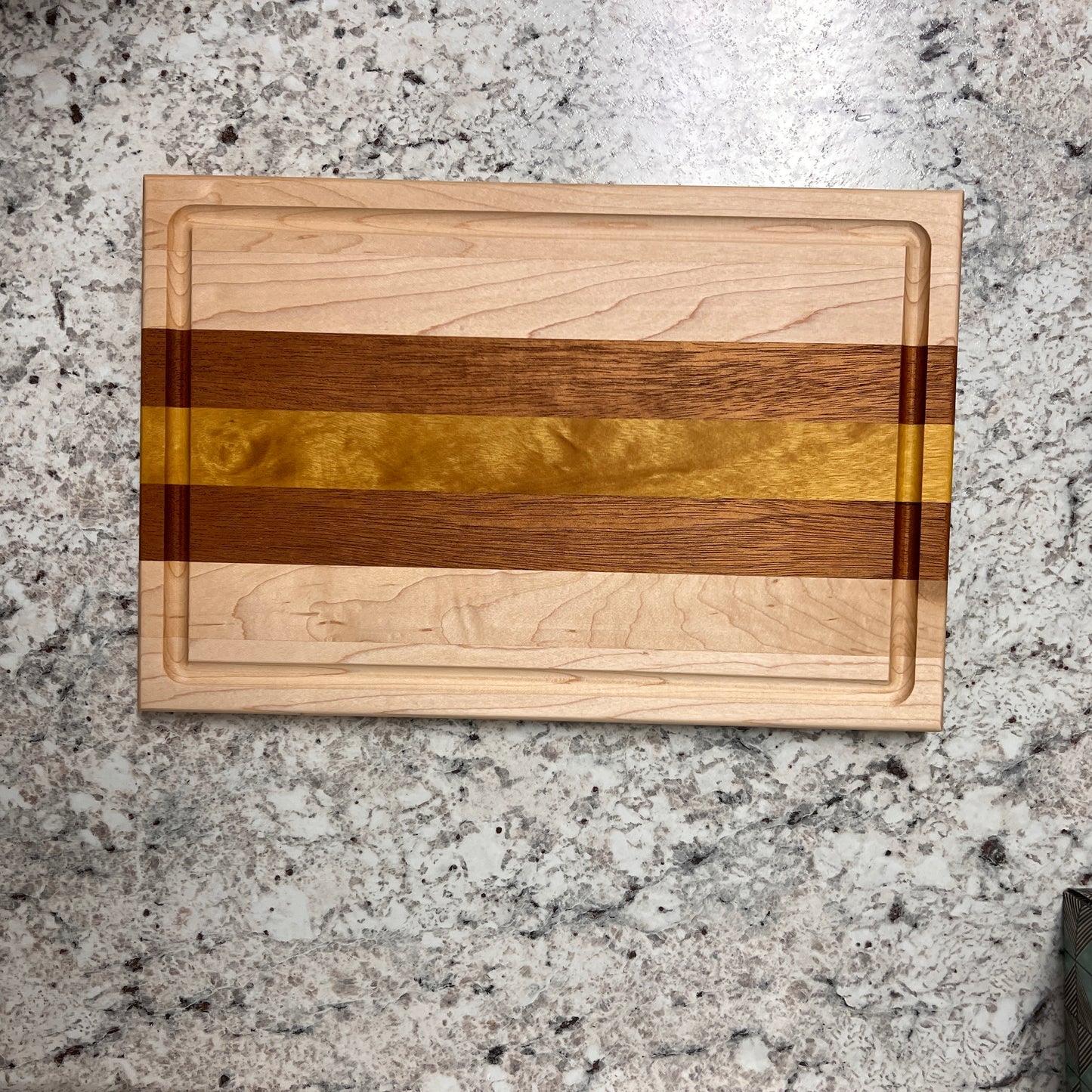 Maple, Mahogany, and Yellow Heart